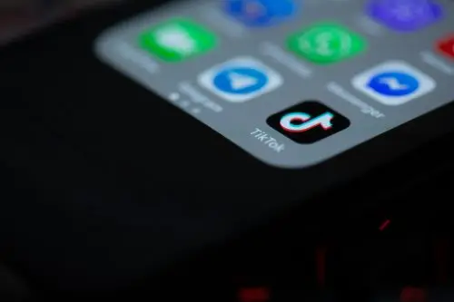 TikTok logo on a phone